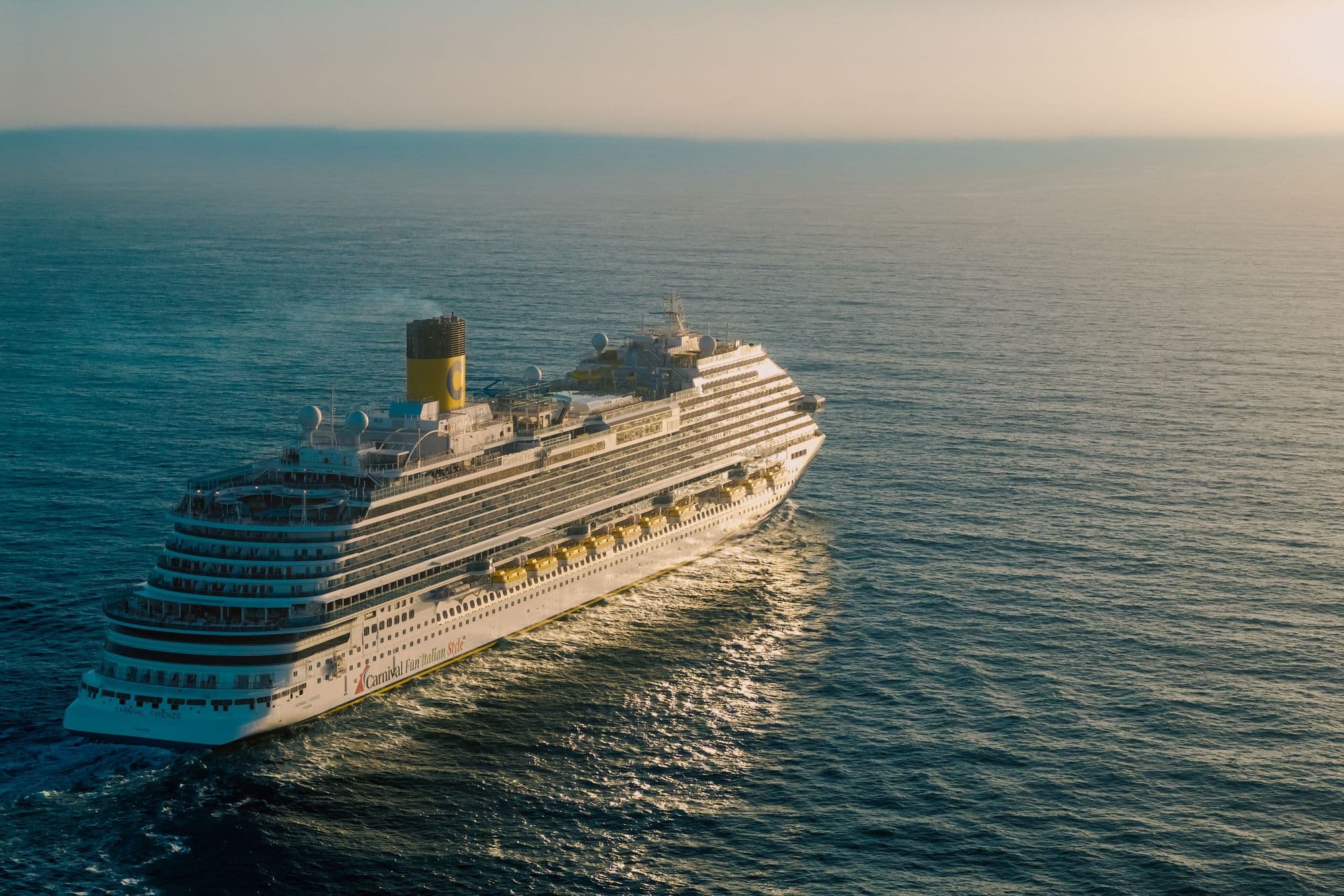 Cruise ship sailing on turquoise open water